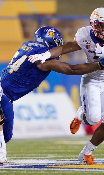 Holani's 4 TDs lead No. 21 Boise St. past San Jose St. 52-42